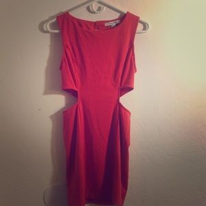 Sexy, orange mini with oblique cutouts!